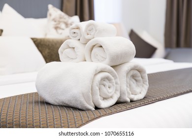 White Towel Roll On Hotel Resort Bed