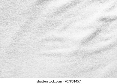 White Towel Texture For Background. That Fabric Or Textile Consist Of Cotton Fiber Material. Look Plush, Fluffy, Dry, Soft And Clean. For Background About Baby, Spa, Hotel, Laundry And Hygiene Etc.