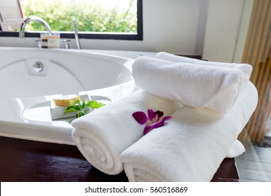 White Towels On Bathtub In Hotel Bathroom