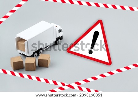 White toy cargo truck or van and signage of prohibition to pass Poland customs border.