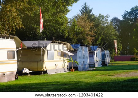 White Trailer Houses On Campsite Chairs Stock Photo Edit Now