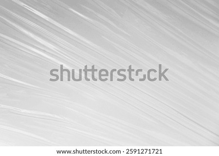 white or translucent plastic sheet with visible creases and folds. the transparent plastic wrap for design overlay
