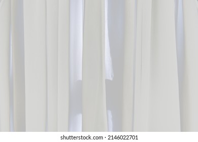 
White Translucent Window Blinds
Classic Lighting Concept, White Background Hanging By The Window In The Room.