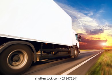 White Truck On The Asphalt Rural Road