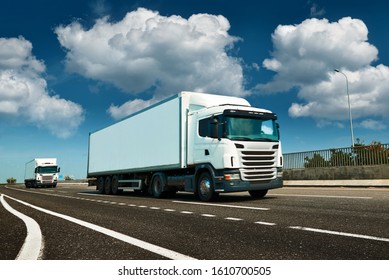 White truck is highway    business  commercial  cargo transportation concept  clear   blank space the side view