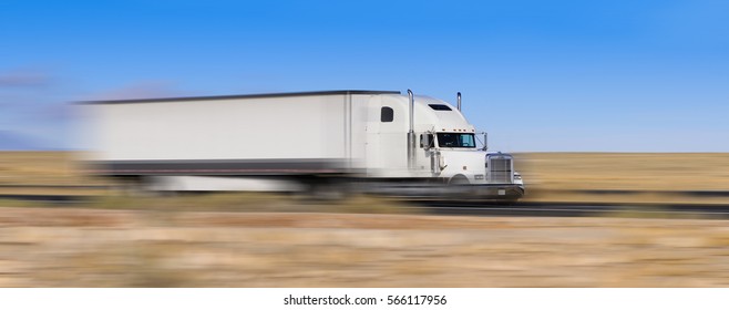 white truck on the move in the desert