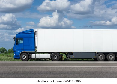 White Truck On Road. Cargo Transportation