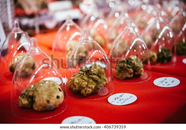 White\
truffles on sale at truffle fair in Alba,\
Italy.