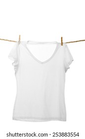 White Tshirt Hanging On A Rope Clothesline Isolated On White