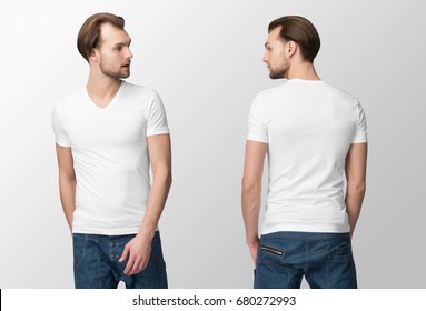 White t-shirt on a young man in jeans, isolated, front and back, mockup.
