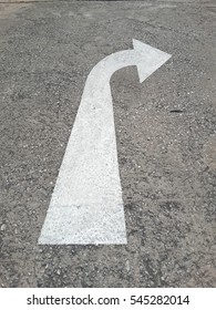 White Turn Right Sign On The Road.