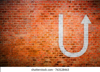 White Turnaround Sign On Vintage Brick Wall, Decision Making Concept