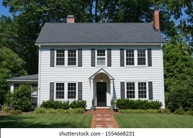 White two-story house built in the 1930s - Shutterstock ID 1554668231