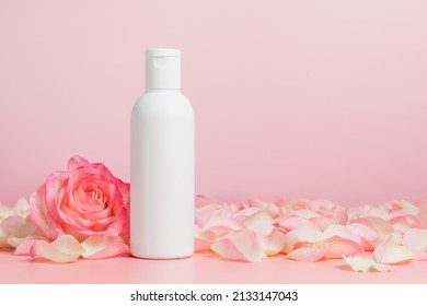 White Unbranded Mockup Bottle Of Body Lotion Or Shampoo With Roses And Petals, Bottle For Logo Or Design, Natural Cosmetic