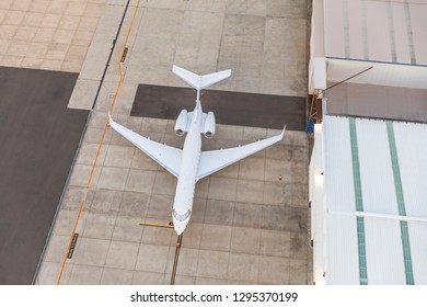 White Unbranded Private Jet Plane Waiting In Runway