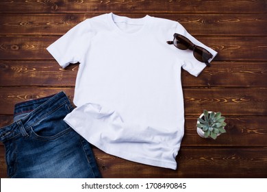 White Unisex Cotton T-shirt Rustic Mockup With Sunglasses, Jeans And Succulent Plant. Design T Shirt Template, Tee Print Presentation Mock Up