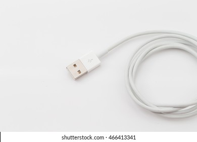 White USB cable on white table