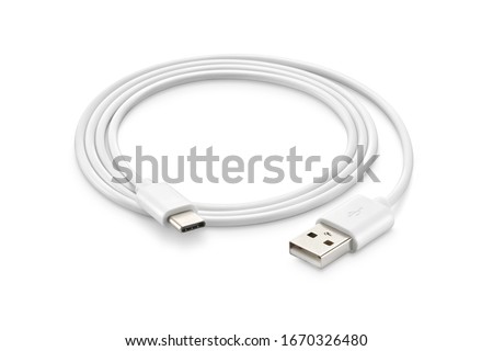 A white USB type C charger cable, compatible for many devices, wrapped in a spiral shape, isolated on white background.