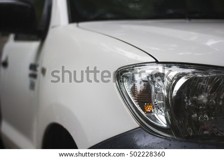 white Ute Headlight Selective Focus Cloudy