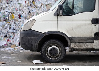 White Van With Bales Of Recycled Paper In A Recycling Facility.