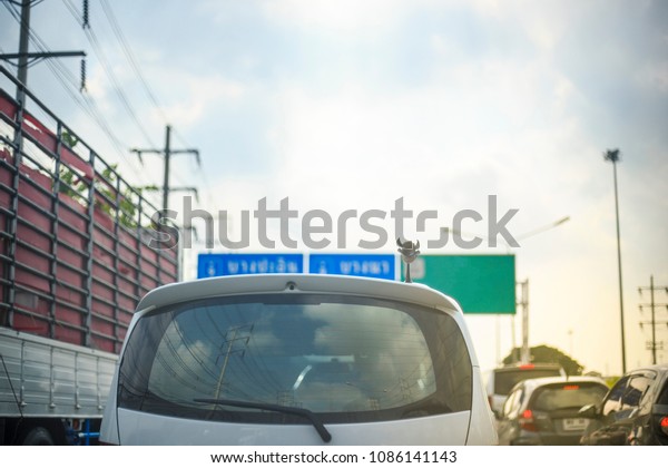 White Van Stuck\
in Traffic in Morning Rush\
Hour