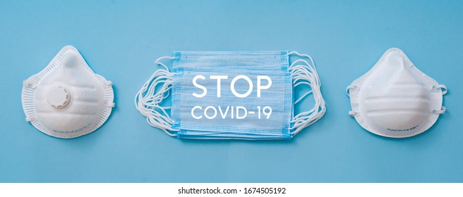 White Variety Of Medical Mask And Respirator On A Blue Background. The Face Mask Protects Against Environmental Pollution, Flu Viruses And Coronavirus. Healthcare And Surgical Concept.