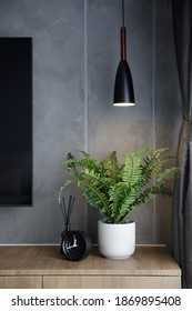 A White Vase Fill With Fake Plant As A Decoration