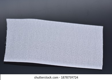 white Velcro tape isolated on black 