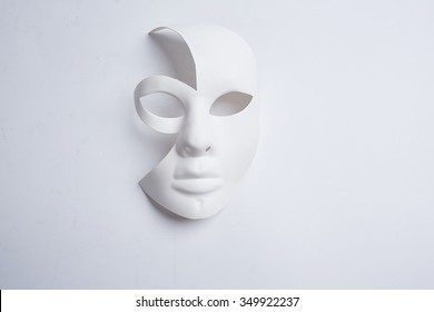 White Venetian Mask On A White Background