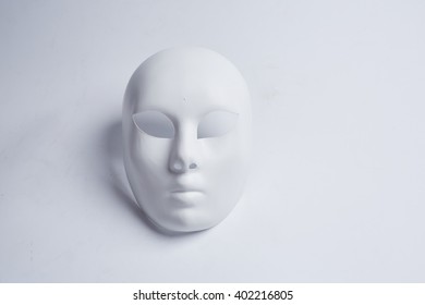 White Venetian Mask On A White Background