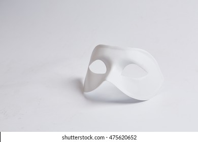 White Venetian Mask On A White Background