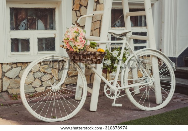 white vintage bike with basket