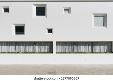 white wall background with windows