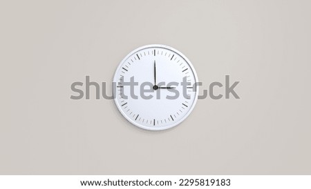 White wall clock with black clockwise hanging on the wall. Minimalist flat lay image of plastic wall clock over soft color background with copy space and central composition.