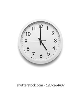 White Wall Clock Isolated On White Background. On The Clock, Five O'clock.