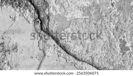 White wall cracks. Wall texture background. cracked concrete wall covered with gray cement surface as background. Crack texture. 