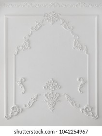 White Wall Decorated With Stucco Molding