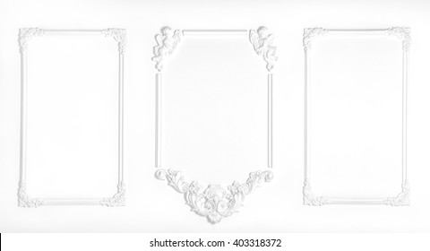 White wall decorated with stucco and molding in the style of Renaissance, Baroque.
