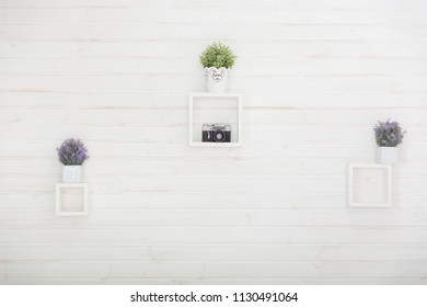 White wall with different photo frames