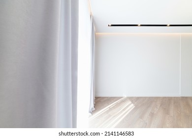 White Wall, Large Window, Floor Made Of Natural Wood Photo For Interior Design