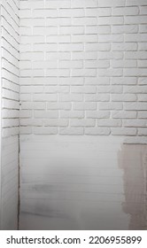 White Wall Made Of Decorative Stone In The Form Of A Brick. Laying Gypsum Bricks During Apartment Renovation.