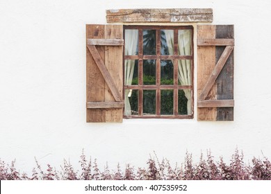 white wall and old wood window