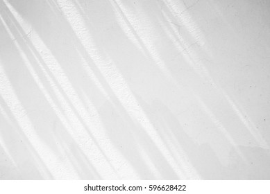 white wall with shadow - Shutterstock ID 596628422