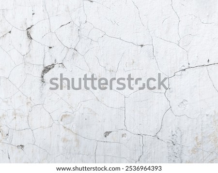 White wall texture background with thin layer of paint and peel off, cracked wall textured paper texture background