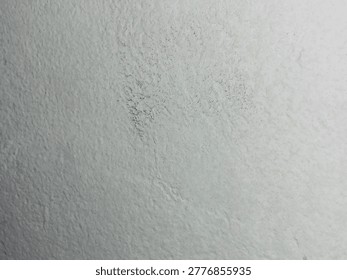 White wall texture with subtle cracks and soft gradient lighting background. 