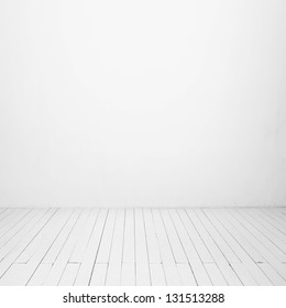 White Wall And Wood Floor