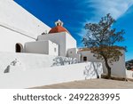 White walls of the church of Santa Eularia aka Puig de Missa under blue sky in Ibiza, Spain.