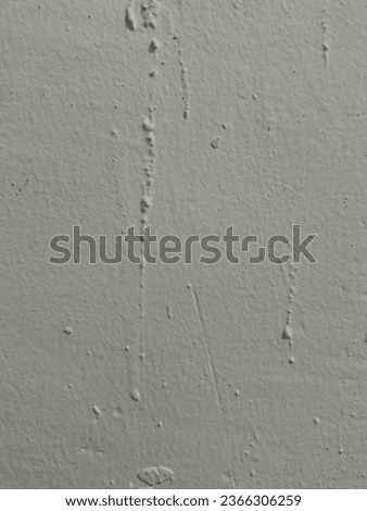 white walls full of paint spots