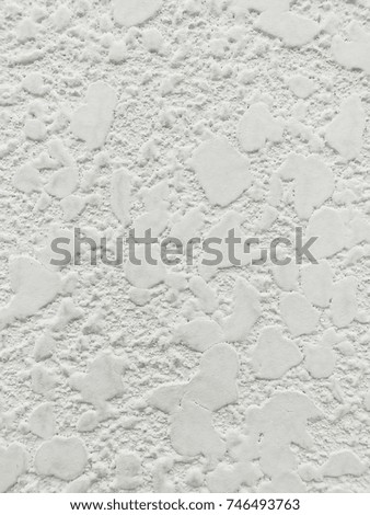 White walls with strange patterns are unique. It is a beautiful and stable art.

