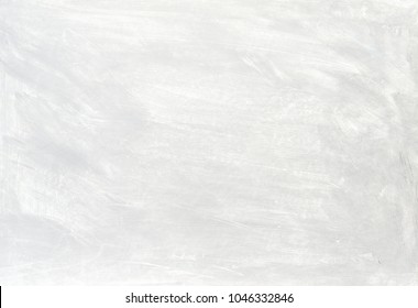 White washed painted textured abstract background with brush strokes in gray and black shades. - Shutterstock ID 1046332846